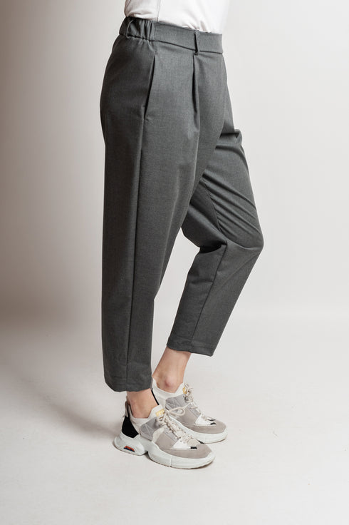 Pantaloni asimmetrici a pieghe Margret